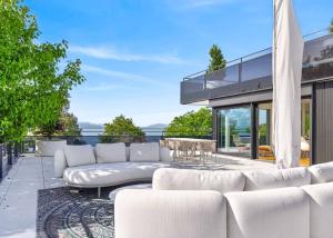 Appartement neuf en angle de 5.5 pièces avec terrasse de 200m² - Vue lac Léman