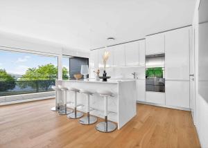 Appartement neuf en angle de 5.5 pièces avec terrasse de 200m² - Vue lac Léman