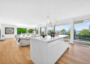 Appartement neuf en angle de 5.5 pièces avec terrasse de 200m² - Vue lac Léman