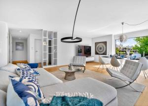 Appartement neuf en angle de 5.5 pièces avec terrasse de 200m² - Vue lac Léman