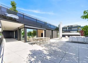 Appartement neuf en angle de 5.5 pièces avec terrasse de 200m² - Vue lac Léman