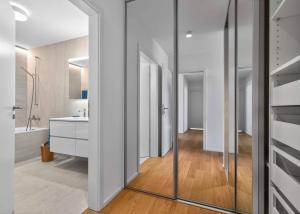 Appartement neuf en angle de 5.5 pièces avec terrasse de 200m² - Vue lac Léman