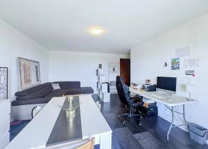 Appartement de 1 pièce - 33.5 m2 avec grand balcon et garage box