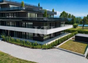 Appartement de 5,5 pièces neuf avec magnifiques finitions en rez de jardin !