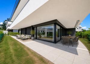Appartement de 5,5 pièces neuf avec magnifiques finitions en rez de jardin !