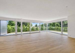 Appartement de 5,5 pièces neuf avec magnifiques finitions en rez de jardin !