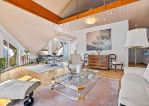 Appartement lumineux de 4.5 pièces au dernier étage avec mezzanine à Belmont-sur-Lausanne