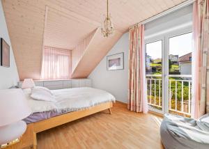 Appartement lumineux de 4.5 pièces au dernier étage avec mezzanine à Belmont-sur-Lausanne