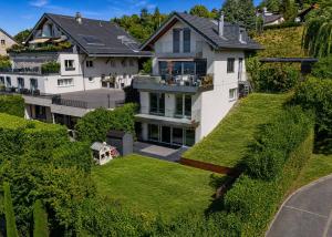 Duplex de 4.5 pièces avec terrasse et jardin