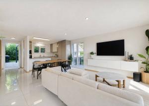 Villa mitoyenne de 5,5 pièces avec espace de jardin privatif de 200m2 